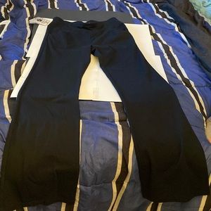 Brand: iuga. Black wide leg stretch pants. Never worn with tags. Size M.